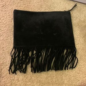 Black front suede clutch with fringe.